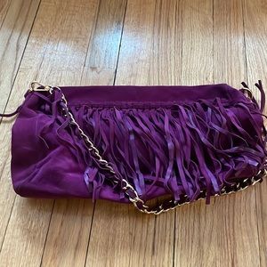 Purple suede handbag